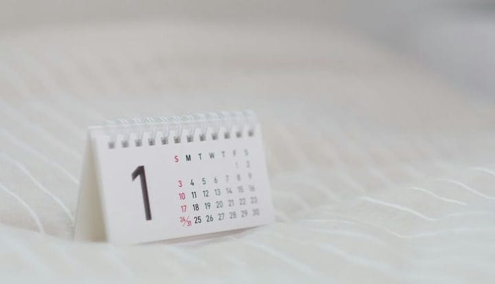 white calendar on white textile